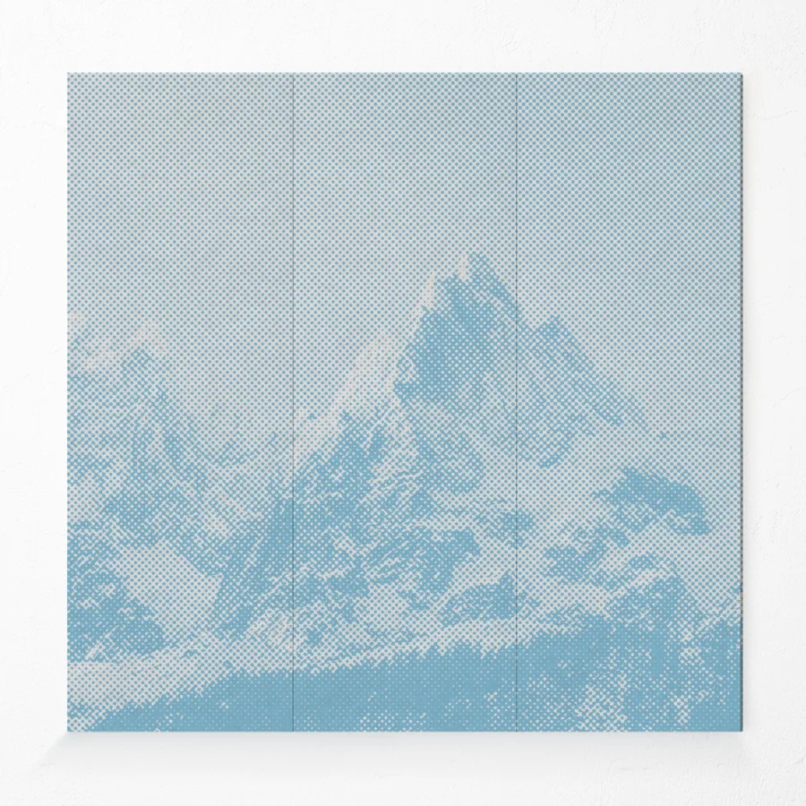 Acoustic compressed polyester wall panel with mountain design in light blue