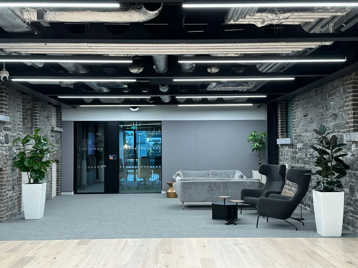 Greyscale office with acoustic panels.